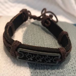 NWOT Leather bracelet with sea turtle charm.